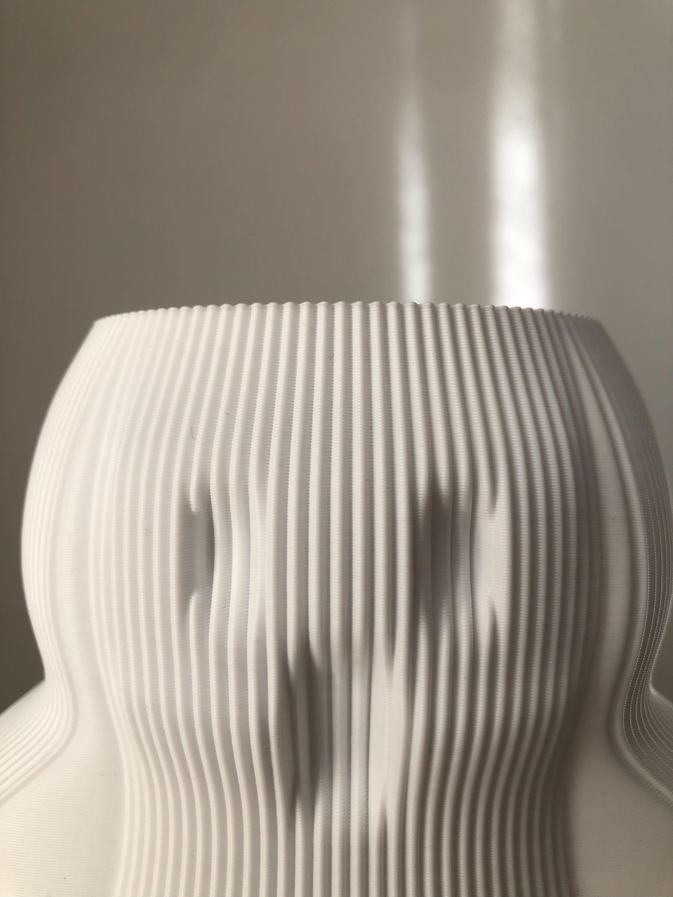 Hauntingly Stylish Wavy Boo Vase - A Must-Have for Halloween!